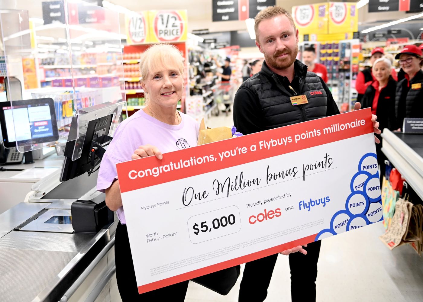 Julie Sandstrom is gifted 1 million Flybuys points at Coles Penrith as thanks for being a loyal shopper
